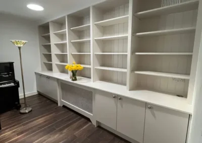 Renovation with Wood Flooring, Custom Shelving and Lighting